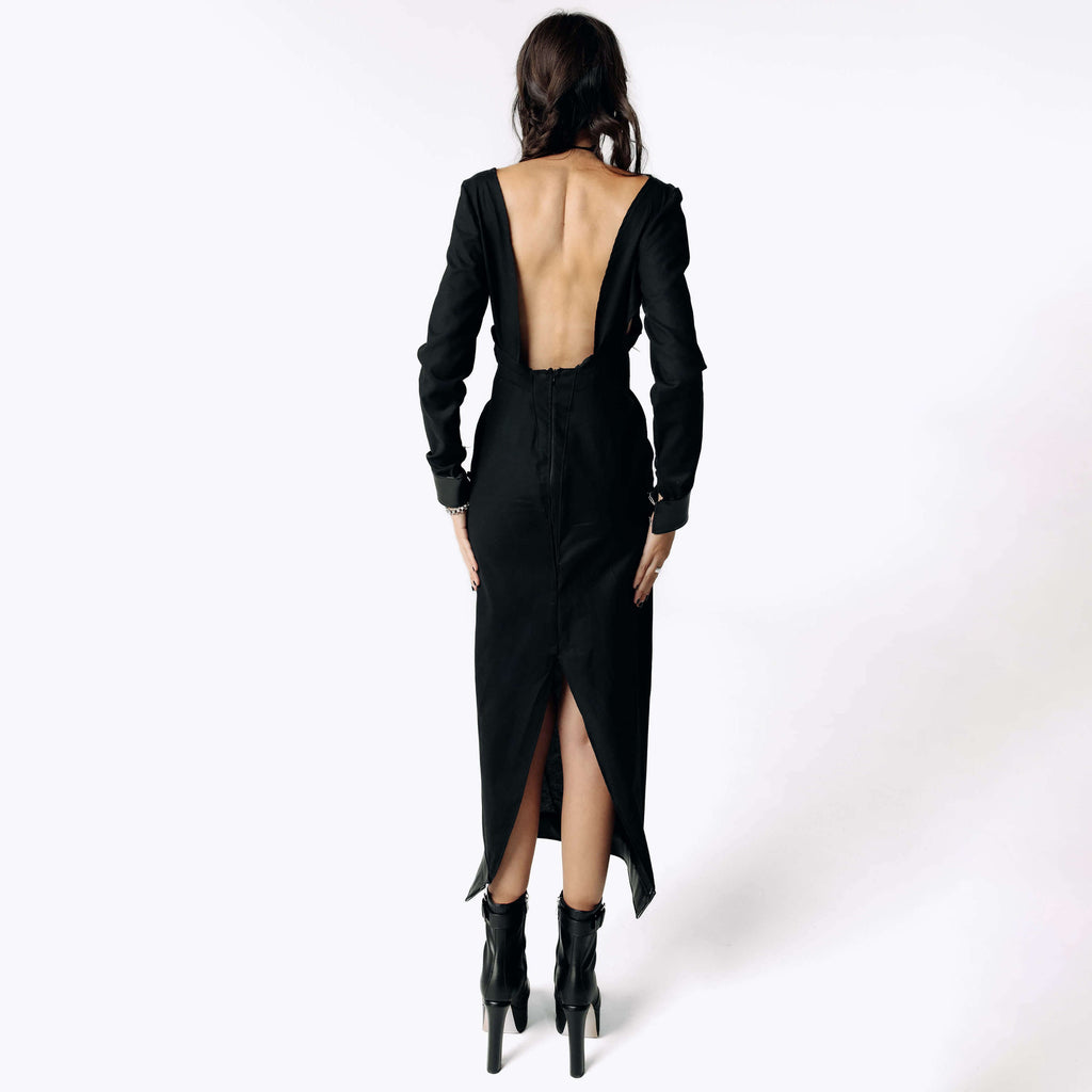 Back view of Eliza wearing the Mors Black Cotton Dress with a deep open back to the waistline from SCATHED's Fall Winter 2025 Reaper collection.