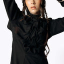Close-up frontal view of Eliza wearing the Mors Black Cotton Dress with ruffling in the chest from SCATHED's Fall Winter 2025 Reaper collection.