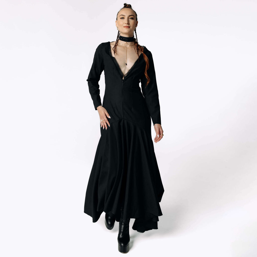 Frontal view of Caitlin facing camera while wearing the Nox Black Cotton Skeleton Dress from SCATHED's Fall Winter 2025 Reaper collection.