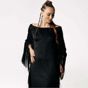 Frontal portrait view of Caitlin  wearing the Revenant Black Dress with fringed sleeves and a high thigh-slit from SCATHED's Fall Winter 2025 Reaper collection.