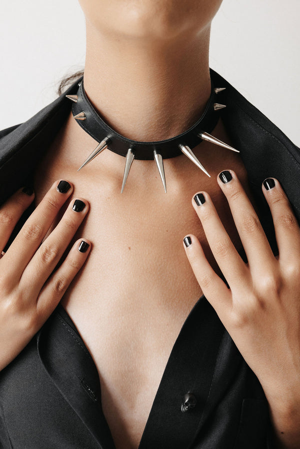 Model wearing a studded cactus leather choker and a bamboo cotton black shirt dress showing details