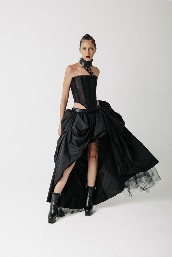 Video of model showing padded ballgown style skirt with tulle and cotton worn with a black corset top