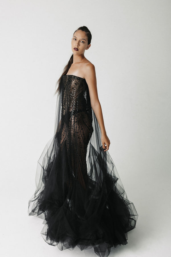 Video of model in beaded and tulle strapless gown showing front, side, and back view