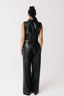 Back view of cactus leather vest showing adjustable lace-up back panel