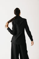  Back view of the Mourner Shirt showing cropped length and fitted silhouette