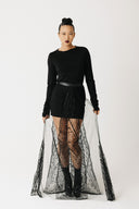 Front view of the Shroud Skirt showing radiating beaded pattern on sheer tulle, worn as a layering piece