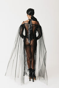 Back view of The Tamar Gown showing the satin ribbon tie and radiating beaded pattern with eco-tulle sleeves