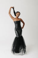 Front view of model wearing the Matilda Gown, a strapless cactus leather mermaid gown with eco tulle flare