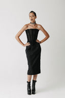 Front view of model wearing the Solace Skirt, an extra-long bamboo cotton pencil skirt, styled with a corset top and choker sold separately