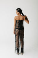 The Razia Gown back view showing adjustable lace up corset closure and chevron beading detail