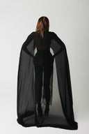 The Somber Top back view showing the sleeves flowing into a full length cape